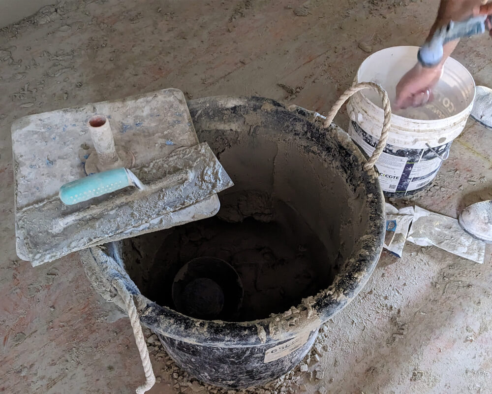 Onsite work in action with acrylic render mixing tools