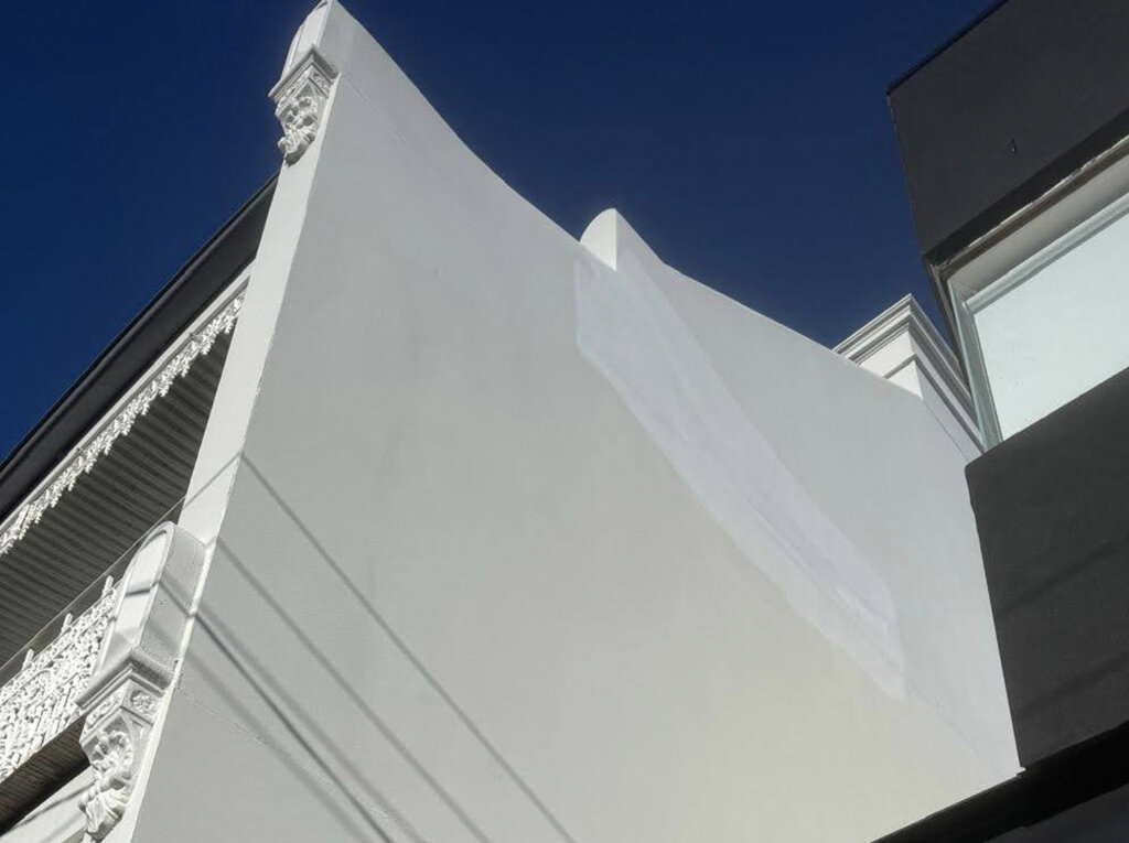 Exterior wall crack repair waterproofing Balmain, Haberfield, wall fixed and painted